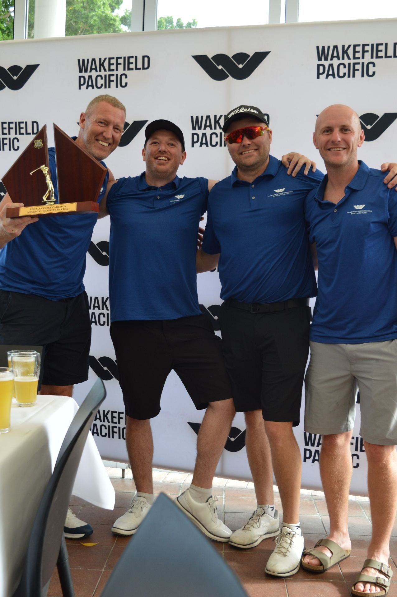 The 2025 winning team holding the Alexander Carlsson Memorial trophy